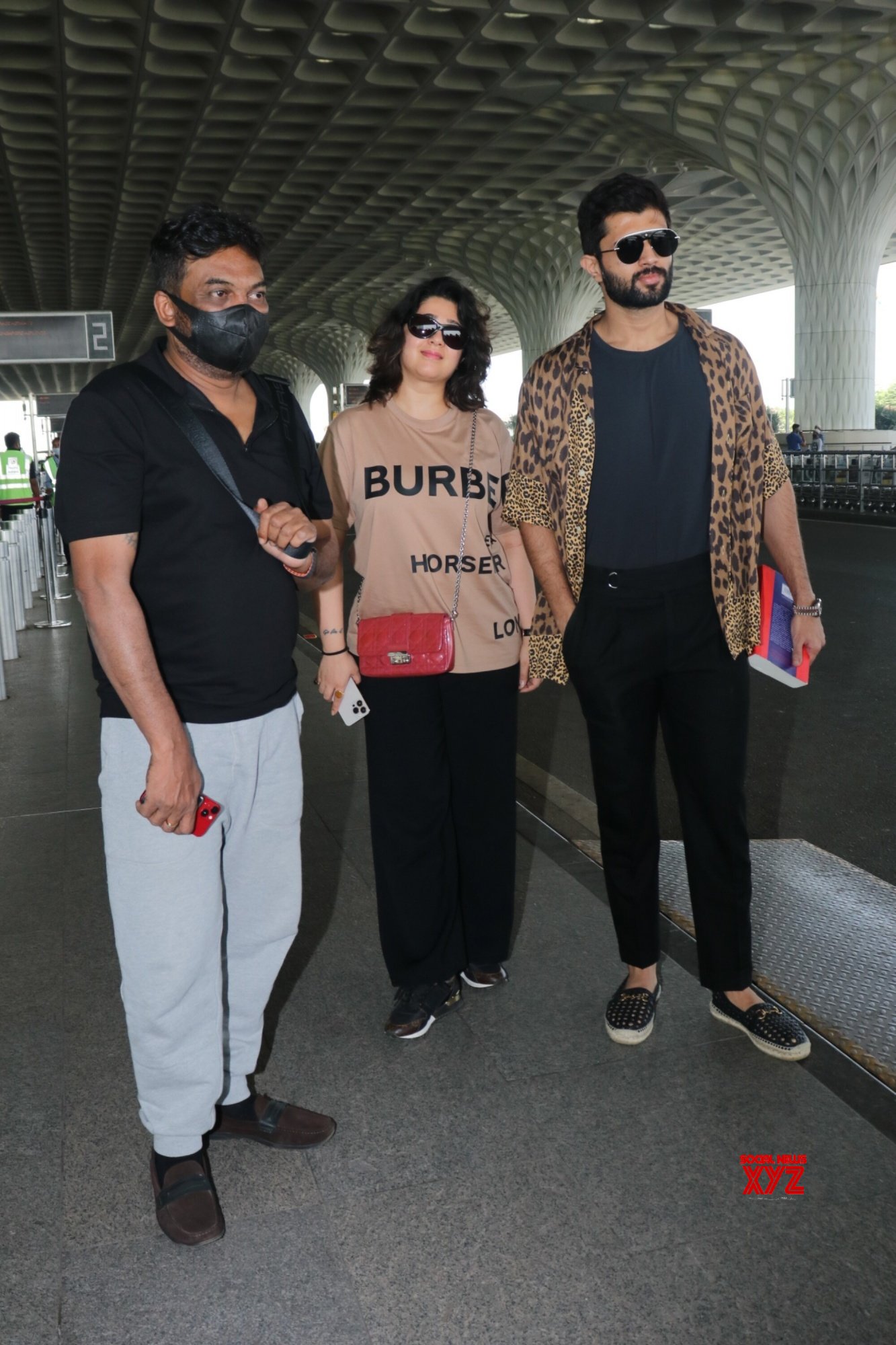 Vijay Deverakonda Charmee Kaur And Puri Jagannadh Spotted At Airport