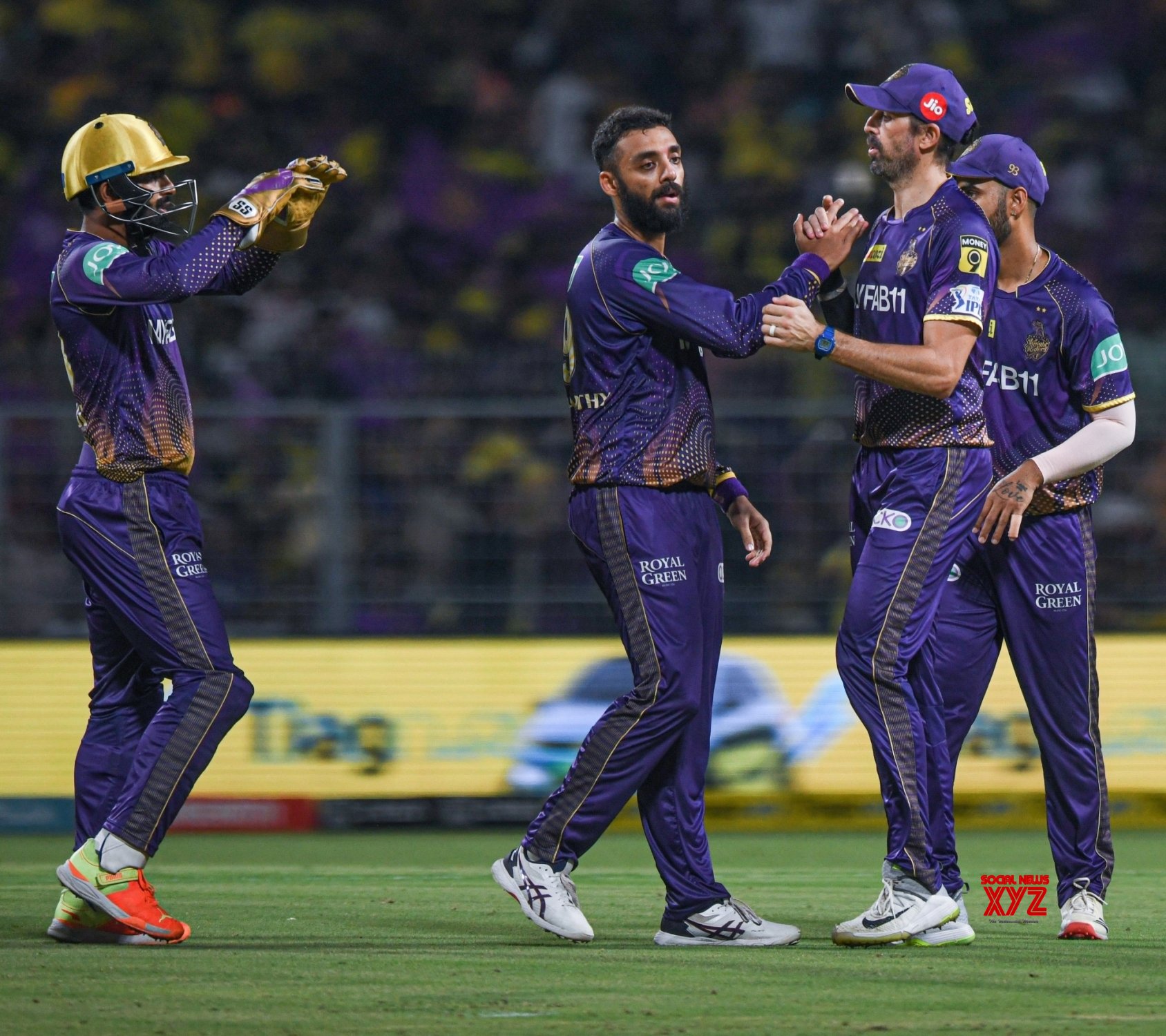 Kolkata: KKR Bowler Varun Chakaravarthy With Teammates Celebrate The ...