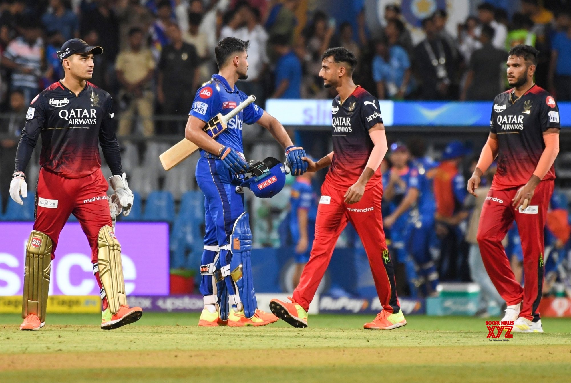 Mumbai : Mumbai Indians' Nehal Wadhera Greets RCB Players After Winning ...