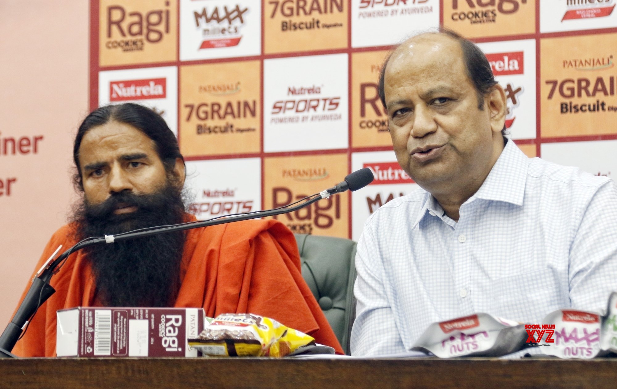 New Delhi: Patanjali Foods CEO Sanjeev Asthana With Yoga Guru Baba ...