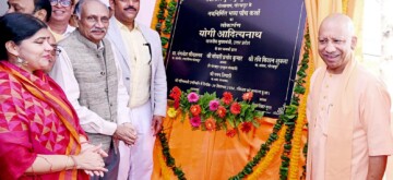 Gorakhpur: Uttar Pradesh Chief Minister Yogi Adityanath, BJP MP Ravi Kishan during the inauguration of  the newly constructed grand auditorium, rooms and administrative building at Mewalal Gupta Gurukul Vidyalaya, Gorakhpur on Sunday, September 29, 2024. (Photo: IANS)