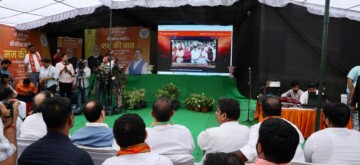 New Delhi: BJP National President JP Nadda listens to Prime Minister Narendra Modi's 'Mann Ki Baat' programme with party workers at Mahipalpur in New Delhi, on Sunday, September 29, 2024. (Photo: IANS)