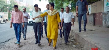 New Delhi: Delhi Chief Minister Atishi along with officials during the inspection of roads in New Delhi on Monday, September 30, 2024. (Photo: IANS)