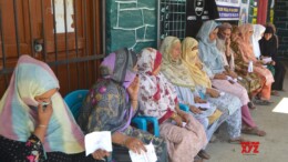 Kupwara: Voters waiting outside a polling booth to cast their votes for the fourth and final phase of Jammu and Kashmir Assembly Elections in Kupwara district on Tuesday, October 01, 2024. (Photo: IANS/Nisar Malik)