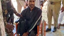 Kupwara: A Persons with Disabilities uses a wheelchair and ramp facility to cast his vote at Polling Station in Kupwara on Tuesday, October 01, 2024. (Photo: IANS)