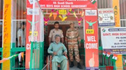 Kupwara: A person with disabilities is assisted by security personnel at a polling station during the third phase of the Jammu & Kashmir Assembly elections in Kupwara on Tuesday, October 01, 2024. (Photo: IANS)