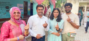 Jhajjar: Olympic double bronze medalist and shooter Manu Bhaker shows her ink-marked finger after casting her vote during the Haryana assembly election in Jhajjar on Saturday, October 05, 2024. (Photo: IANS)