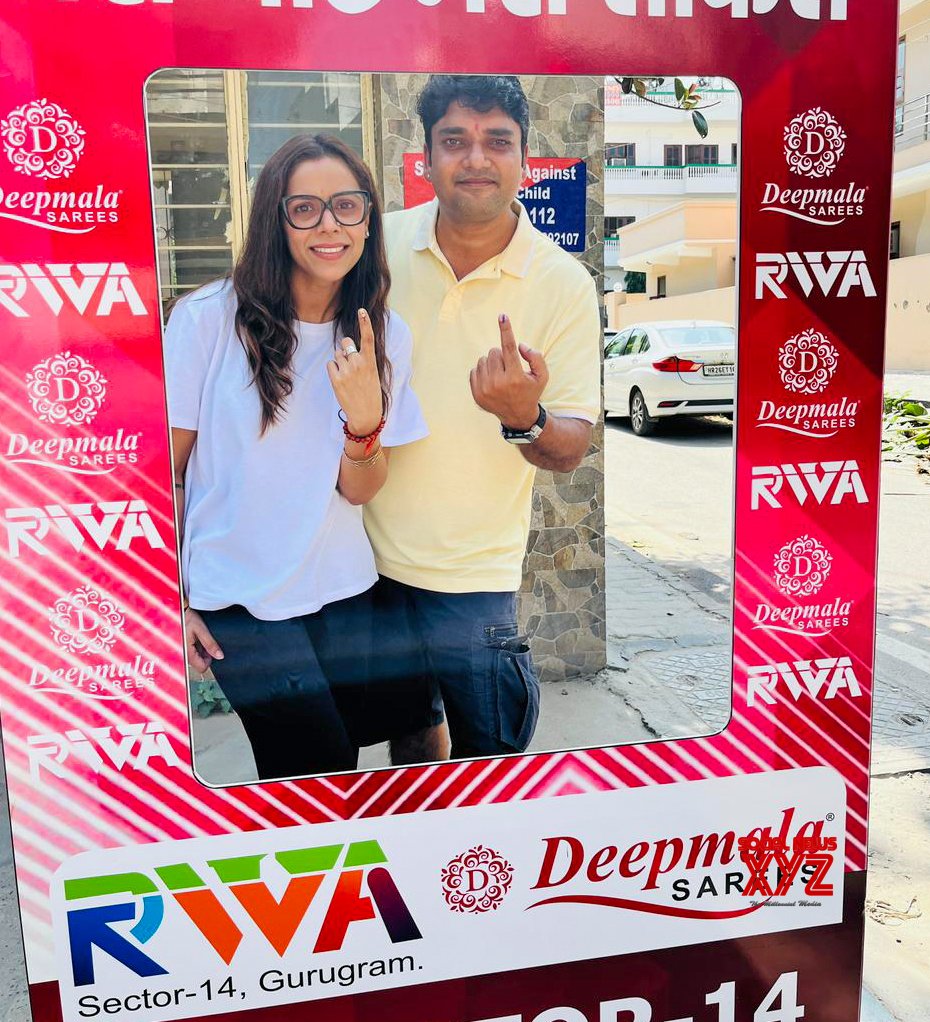 Gurugram: Voters show their ink marked fingers after casting their vote #Gallery