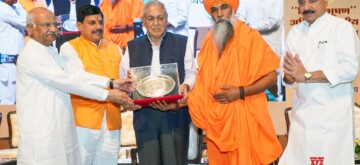 Bhopal: Madhya Pradesh Chief Minister Mohan Yadav presents "Shiksha Bhushan" to K.K. Agrawal during the inauguration of the Shiksha Bhushan All India Samman Samaroh at Ravindra Bhawan, Bhopal, on Sunday, October 06, 2024. Minister for Transport of Madhya Pradesh Uday Pratap Singh, All India Executive Member of Rashtriya Swayamsevak Sangh Suresh Soni, and Rajya Sabha MP Umesh Nath also present. (Photo: IANS)