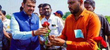 Buldhana: Maharashtra Deputy Chief Minister Devendra Fadnavis receives a warm welcome on his arrival in Buldhana, Maharashtra, on Sunday, October 06, 2024. (Photo: IANS)