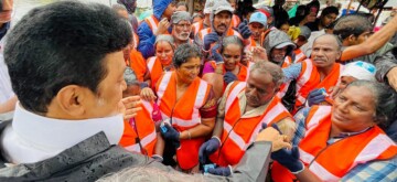 Chennai: Tamil Nadu Chief Minister M.K. Stalin meets sanitation workers who are continuously working to remove rainwater in Chennai on Wednesday, October 15, 2024. (Photo: IANS)