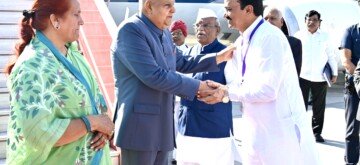 Jaipur: Vice President Jagdeep Dhankhar and his wife Sudesh Dhankhar receive a warm welcome by Rajasthan Deputy Chief Minister Prem Chand Bairwa on their arrival at Jaipur Airport on Tuesday, October 15, 2024. (Photo: IANS)