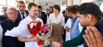 Srinagar: Leader of Opposition in Lok Sabha, Rahul Gandhi, and Congress General Secretary Priyanka Gandhi receive a warm welcome upon their arrival at the airport, in Srinagar, on Wednesday, October 17, 2024. (Photo: IANS)