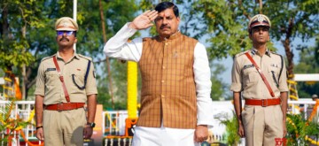 Ujjain: Madhya Pradesh Chief Minister Mohan Yadav salutes along with police personnel during an event organized on the occasion of Police Martyrs' Memorial Day at Police Line in Ujjain on Monday, October 21, 2024. (Photo: IANS)