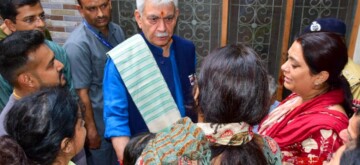 Ganderbal: Lieutenant Governor Manoj Sinha meets the family of martyr Shashi Abrol, who was kiled in the militant attack in Ganderbal on Monday, October 21, 2024. (Photo: IANS)