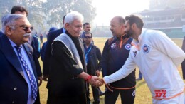 Srinagar: Jammu and Kashmir Lieutenant Governor Manoj Sinha interacts with  the players & coaching staff of Jammu Kashmir and Services Teams ahead of their Ranji Trophy match in Srinagar on Saturday, October 26, 2024. (Photo: IANS)