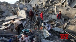 (241101) -- NUSEIRAT REFUGEE CAMP, Nov. 1, 2024 (Xinhua) -- People stand on the rubble of a building destroyed in an Israeli attack in the Nuseirat refugee camp, central Gaza Strip, on Nov. 1, 2024. At least 30 people were killed in Israeli air and artillery strikes across the Gaza Strip on Friday, according to Palestinian sources. Palestinian security sources told Xinhua that the Israeli army has intensified its attacks on different areas across the Strip, particularly the Nuseirat refugee camp in central Gaza. (Photo by Rizek Abdeljawad/Xinhua)