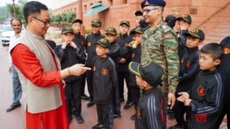 New Delhi: Union Minister of Parliamentary Affairs and Minority Affairs Kiren Rijiju interacts with students from the Mahabodhi Positive Living Society, Teli, Tawang, who are on a National Integration Tour organised by the 4 Corps/71 Infantry Division, at Parliament House in New Delhi on Tuesday, November 5, 2024. (Photo: IANS)