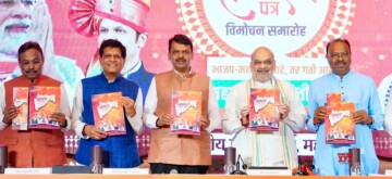 Mumbai: Union Home Minister Amit Shah, along with Union Minister Piyush Goyal, Maharashtra Deputy CM Devendra Fadnavis, and BJP State President Chandrashekhar Bawankule, unveils the BJP's manifesto for the upcoming Maharashtra Assembly Elections 2024 in Mumbai on Sunday, November 10, 2024. (Photo: IANS)