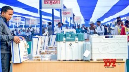 Koderma: Polling officers with the Electronic Voting Machine (EVMs)/Ballot unit and other election-related material for the first phase of voting ahead of the Jharkhand assembly election at the dispatch center in Koderma on Tuesday, November 12, 2024. (Photo: IANS)