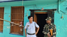 North 24 Parganas: Security personnel stand guard outside a polling booth during the Naihati by-poll elections in North 24 Parganas on Wednesday, November 13, 2024. (Photo: IANS)