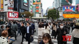 (231115) -- TOKYO, Nov. 15, 2023 (Xinhua) -- This photo taken on Nov. 15, 2023 shows people walking past a crossing in Tokyo, Japan. Japan's economy shrank by an annualized rate of 2.1 percent in the July-September period, the government said on Wednesday, marking the first contraction in three quarters. (Xinhua/Zhang Xiaoyu)