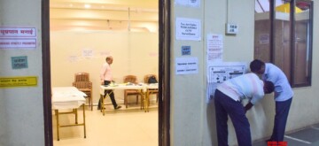 Mumbai: Election Commission staff prepare a polling booth for the Maharashtra Assembly elections at Sharda Mandir School, Gamdevi, in Mumbai on Tuesday, November 19, 2024. (Photo: Nitin Lawate)